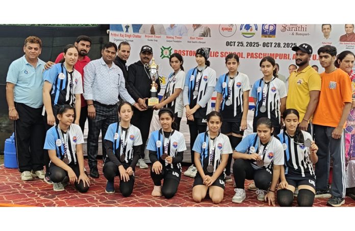 Dignitary presenting trophy to J&K Roll Ball team. Dignitary presenting trophy to J&K Roll Ball team.