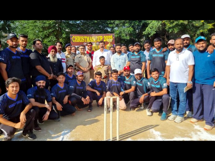 MLA Jammu West Arvind Gupta posing alongwith football players during inaugural event of Christmas Cup 2025.