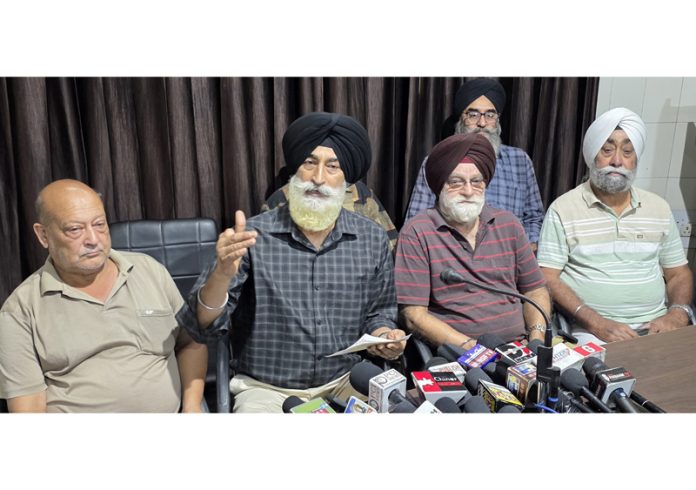 RTI activist Balvinder Singh addressing a press conference at Press Club, Jammu. -Excelsior/Rakesh