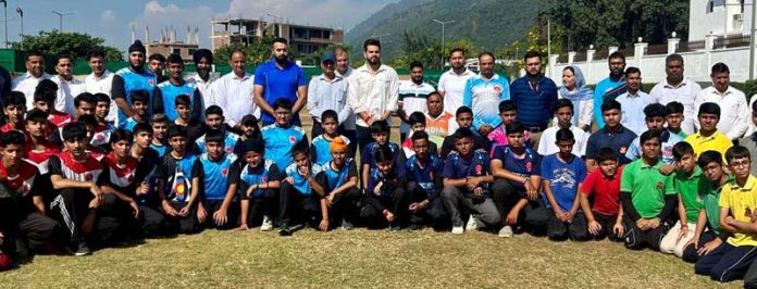 Archers posing along with dignitaries during UT-Level Archery Competition.