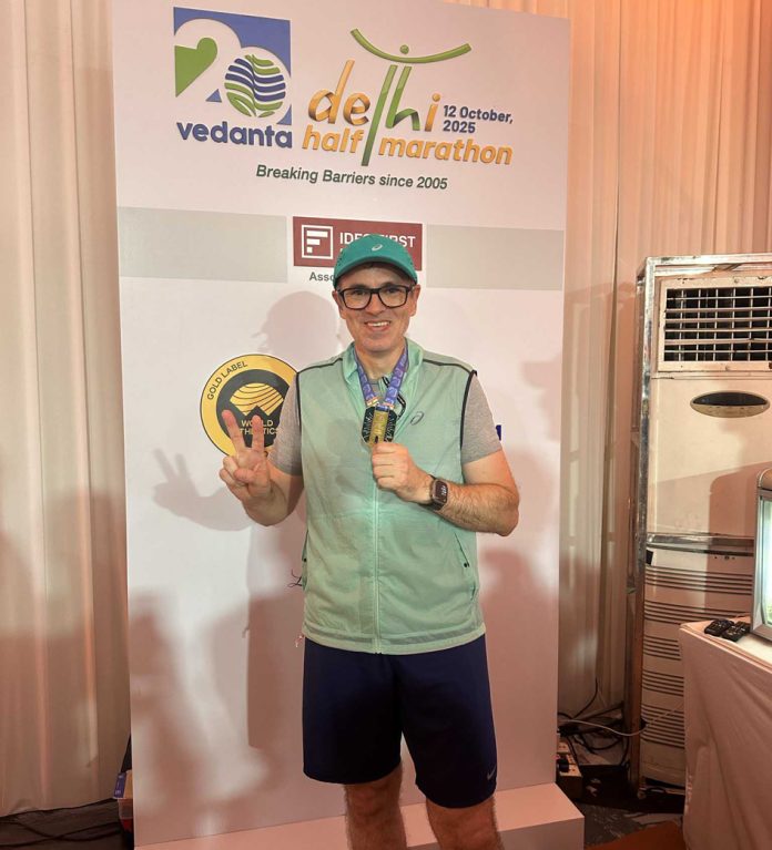 Jammu and Kashmir Chief Minister Omar Abdullah takes part in Delhi Half Marathon in New Delhi on Sunday. (UNI)