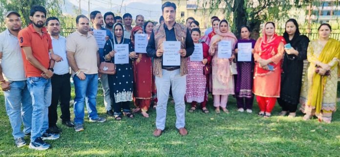 NHM employees during a peaceful protest in Kishtwar on Tuesday.