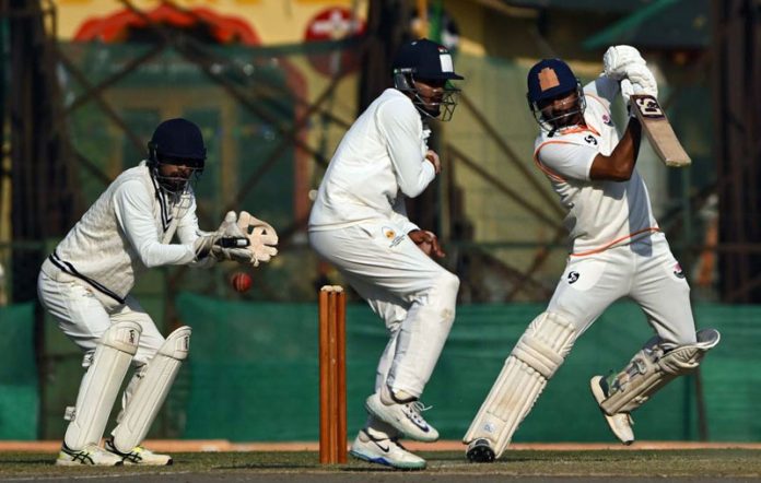 Paras Dogra in action during his inning of unbeaten 112 runs against Mumbai.