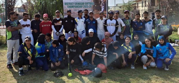 Softball teams posing along with dignitaries. Softball teams posing along with dignitaries.