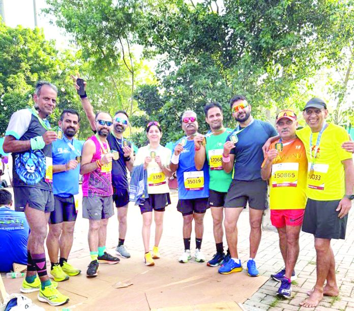 Jammu runners posing for group photograph. Jammu runners posing for group photograph.