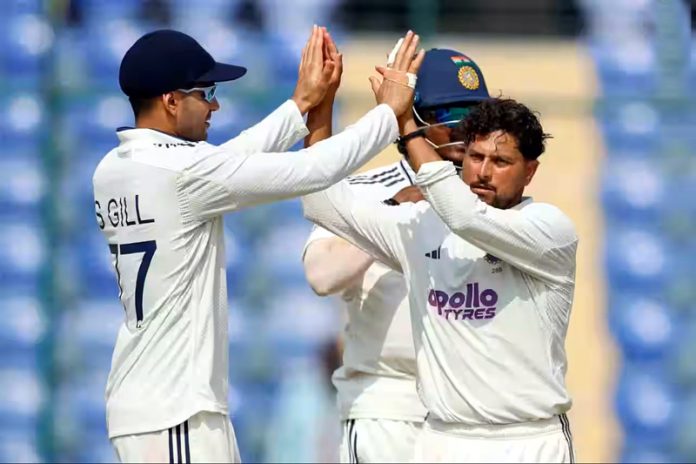 Kuldeep Yadav celebrating after taking a wicket against West Indies at New Delhi.
