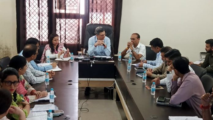 Relief Commissioner chairing a meeting on Wednesday.