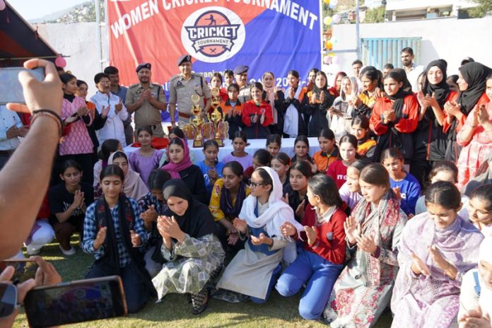 Young players posing with dignitaries during T-20 Women’s Cricket Tournament inauguration at Doda.