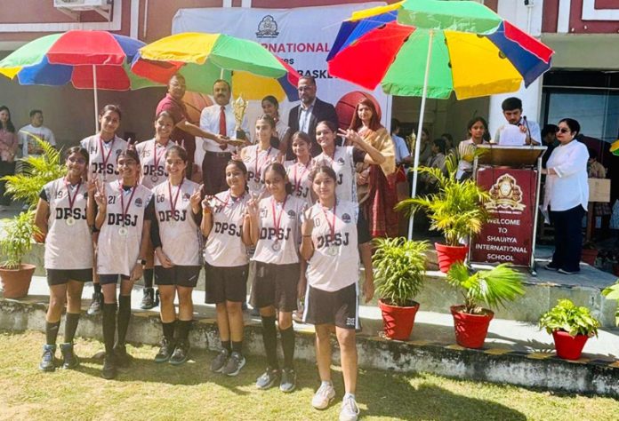 DPS Girls' Basketball team pose for a photograph after winning Gold Medal in Slam Jam Challenge Basketball Tournament.