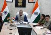 LG Kavinder Gupta chairing a meeting in Leh on Monday.