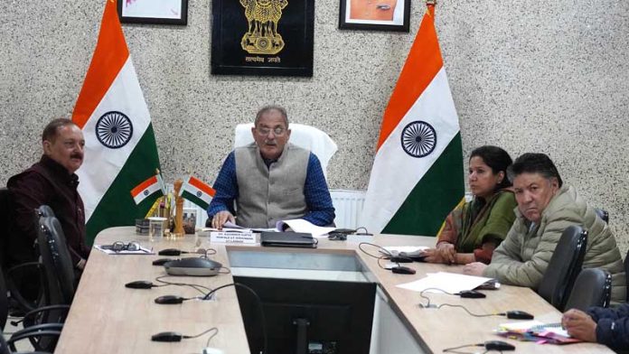 LG Kavinder Gupta chairing a meeting in Leh on Monday.