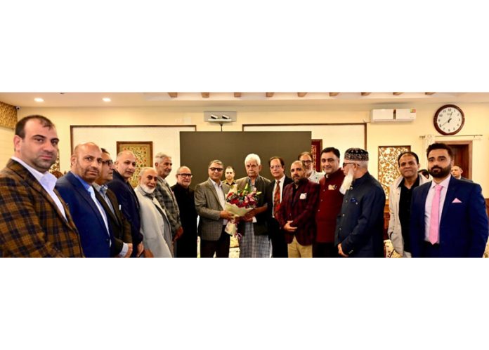 A delegation of the Kashmir Chanber of Commerce and Industry (KCCI) meeting Lt Governor on Saturday.