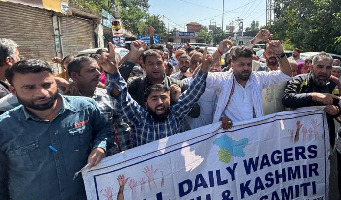 Daily Wagers from various departments staging protest in Jammu. -Excelsior/Rakesh