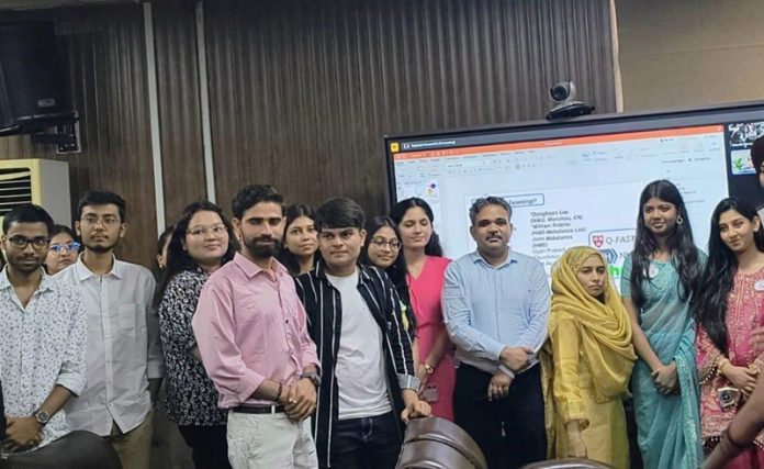 CUJ faculty members posing with resource person of guest talk.