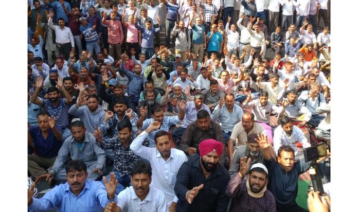 PHE daily wagers staging strong protest in Jammu on Thursday. -Excelsior/Rakesh