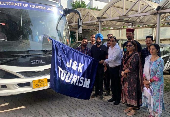 Director Tourism flagging off paragliding pilots for training on Wednesday.