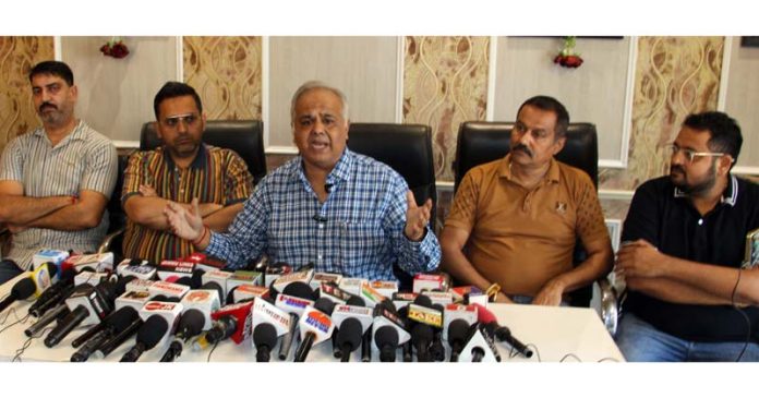 President of the Traders Federation Ware House Nehru Market, Deepak Gupta addressing a press conference at Jammu.