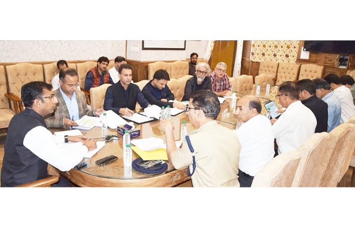 Divisional Commissioner Kashmir chairing a meeting on Saturday.