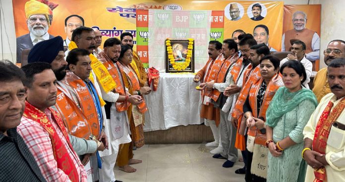 BJP leaders paying tribute to Bhagwan Valmiki on his Jayanti at Jammu on Tuesday. BJP leaders paying tribute to Bhagwan Valmiki on his Jayanti at Jammu on Tuesday.