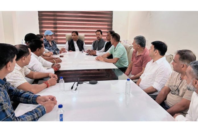 BJP president and other leaders in a meeting with members of OBC community at Jammu on Saturday.
