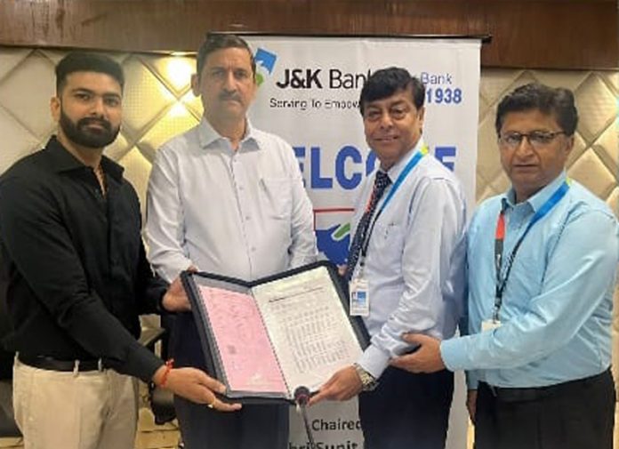 Dignitaries from J&K Bank signing an MoU with Vintage Green Housing Group in Mohali on Thursday.