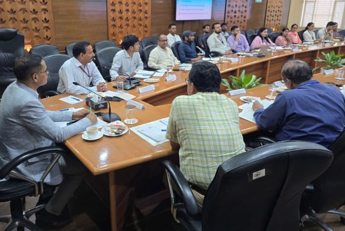 Regional Director RBI, C S Azad, senior officers from DoT, different banks during awareness session on financial frauds at RBI office in Jammu.