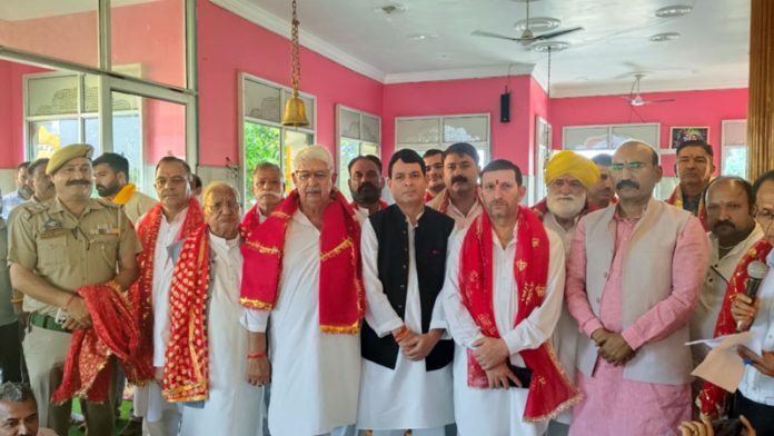 MLA Mohan Lal and members of Brahman Sabha Akhnoor during function on Sunday.