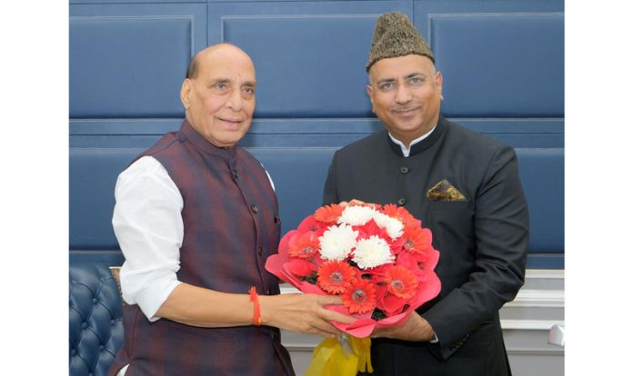 MP Gulam Ali Khatana presenting a bouquet to Defence Minister Rajnath Singh on Thursday. MP Gulam Ali Khatana presenting a bouquet to Defence Minister Rajnath Singh on Thursday.