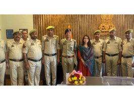 DIG Udhampur-Reasi Range with promotee officials posing for a group photograph.