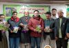 MP Ladakh, Mohd Hanifa Jan along with others releasing book ‘Ladakh Mai Dard Sheen Ki Amad’ in Kargil on Sunday.