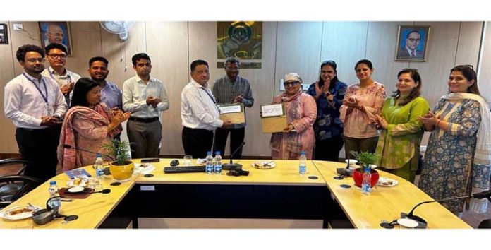 Aarti Chowdhary and Rattan Lal, Deputy General Manager, NABARD signing MoU in Jammu. Aarti Chowdhary and Rattan Lal, Deputy General Manager, NABARD signing MoU in Jammu.