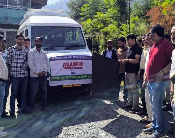 MLA Ramban Arjun Singh flagging off farmers vehicle to a five day exposure visit on Sunday.