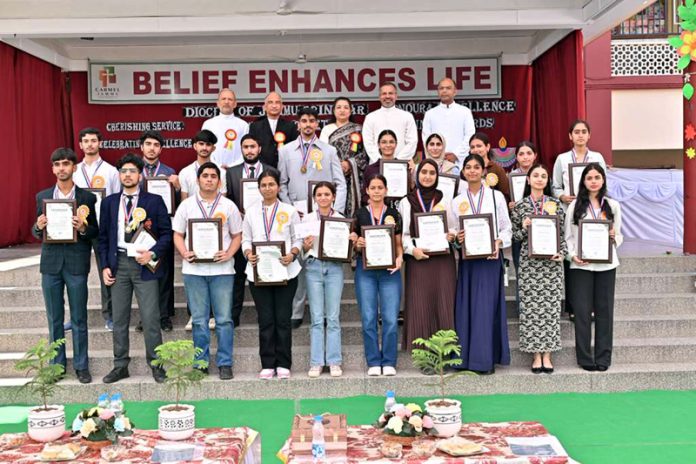 Dignitaries along with academic toppers at a function organised by DJSES in Jammu.