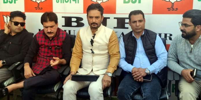 BJP spokesperson, Dr. Abhijeet Jasrotia along with others addressing a press conference in Srinagar on Tuesday.