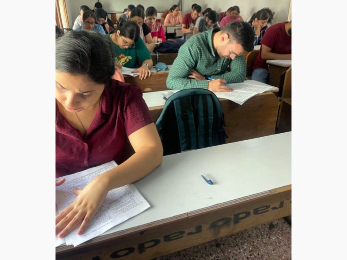 Students busy in solving JKAS Prelims 2025 Test Series launched by SRCC in Jammu. Students busy in solving JKAS Prelims 2025 Test Series launched by SRCC in Jammu.