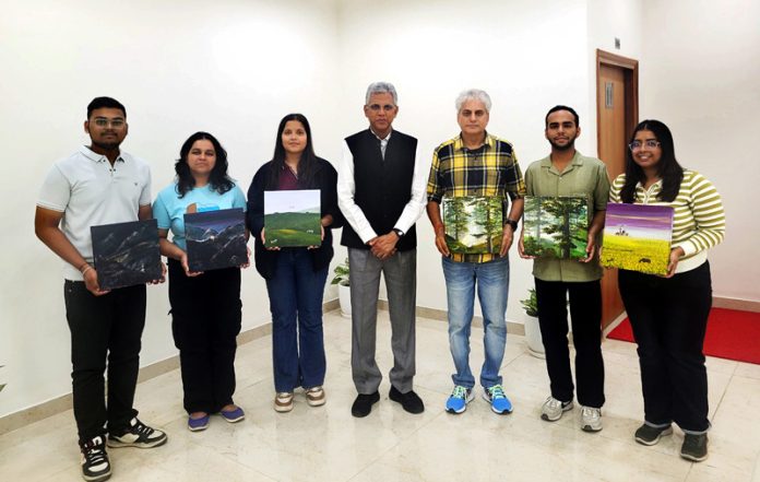 IIM Jammu students posing with renowned artist KK Gandhi at his art studio.