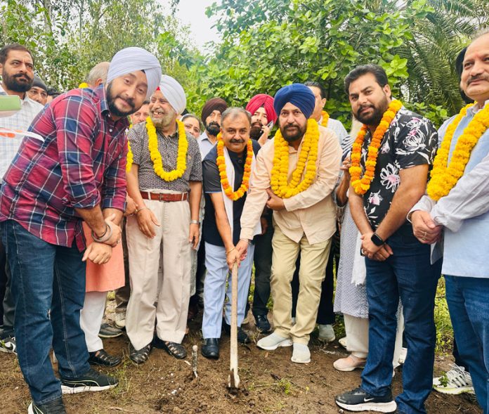 MLAs, Ch Vikram Randhawa and Dr Narinder Singh laying foundation stone of cremation ground at Rani Bagh, Satwari on Monday.