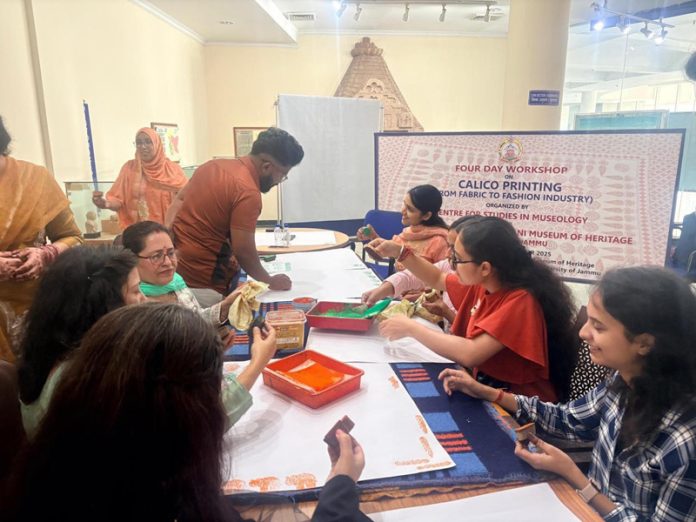 Artisans and craft enthusiasts engage in hands-on session during Calico printing workshop at JU.