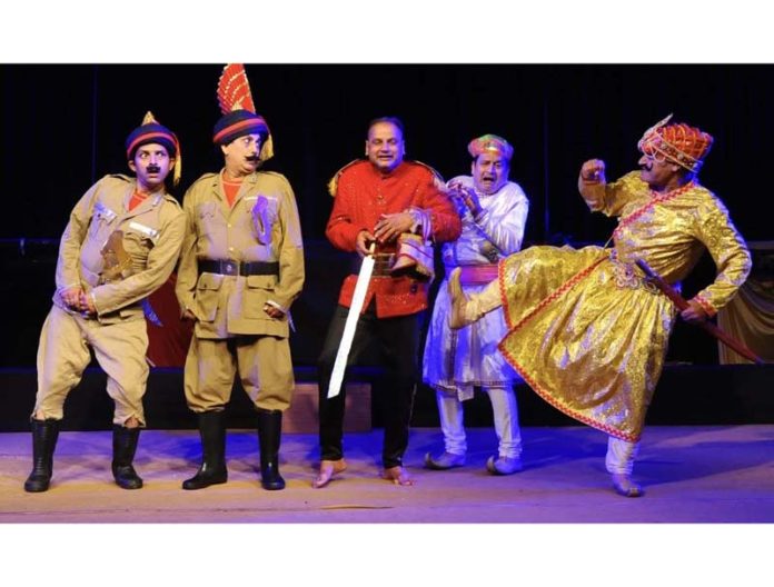 Artists performing in a play staged by Natrang on Saturday.