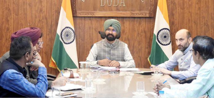 DC Doda chairing a meeting on Friday.