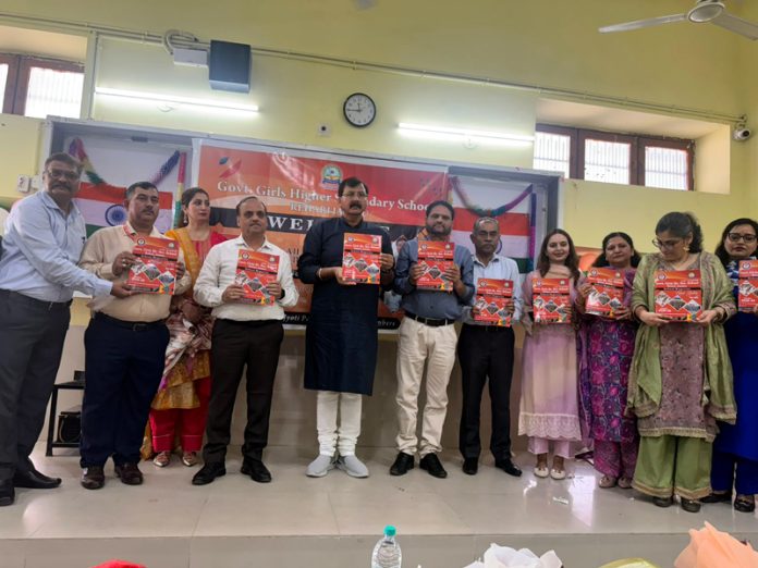 MLA Arvind Gupta along with others releasing the Annual School Magazine ‘Vishav Shakti’ at GGHSS, Rehari on Friday.