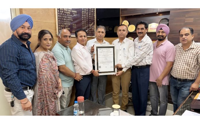 Anil Gupta, Director Agriculture posing along with others during a function in Jammu.