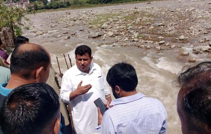 MLA Rajouri, Iftkhar Ahmed discussing modern slaughter house project issue with officials.