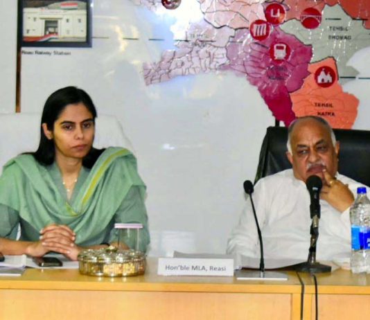 DC Reasi Nidhi Malik chairing a meeting on Wednesday.