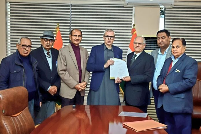 BDSA J&K president, B R Kundal presenting a memorandum to Chief Minister Omar Abdullah.