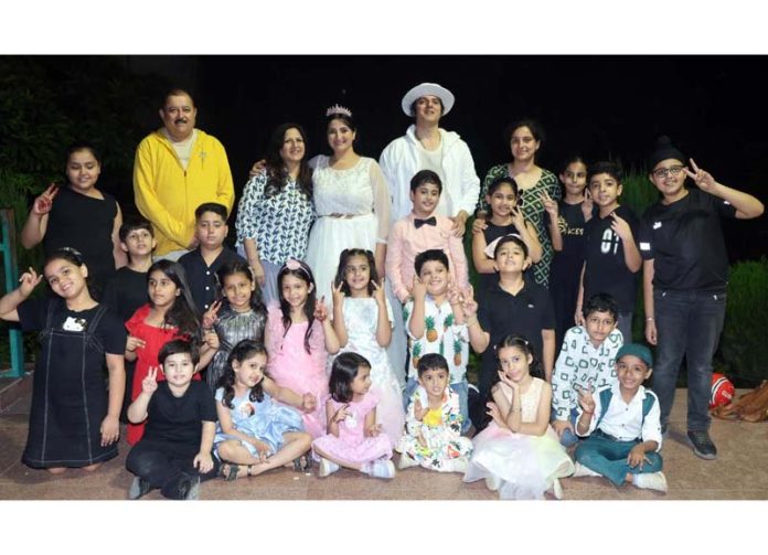 NC leader Rajesh Gupta posing along with artists in Jammu.