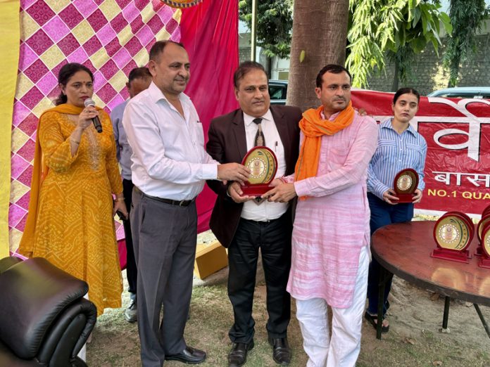 A farmer being honoured during a programme organized by Sarveshwar Group in Jammu. A farmer being honoured during a programme organized by Sarveshwar Group in Jammu.