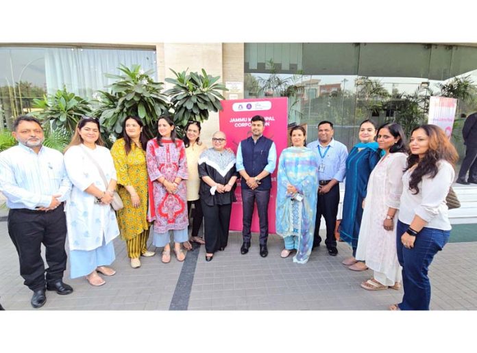 Dr Devansh Yadav, Commissioner, JMC posing along with others in Jammu. Dr Devansh Yadav, Commissioner, JMC posing along with others in Jammu.