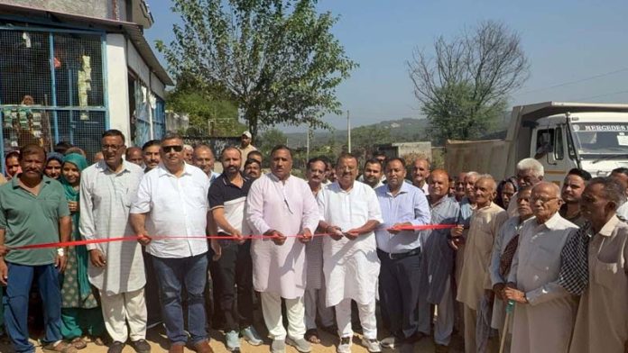 MLA Vijaypur, Chander Parkash Ganga kick starting black topping of road in Vijaypur Assembly segment on Friday.