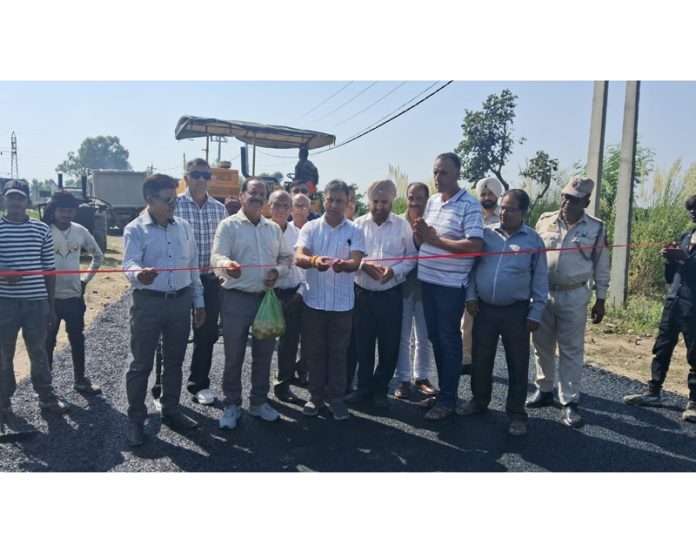 MLA Kathua, Dr Bharat Bhushan kick starting the macadamization of road from National Highway to Radha Swami Satsangh Ashram on Saturday MLA Kathua, Dr Bharat Bhushan kick starting the macadamization of road from National Highway to Radha Swami Satsangh Ashram on Saturday